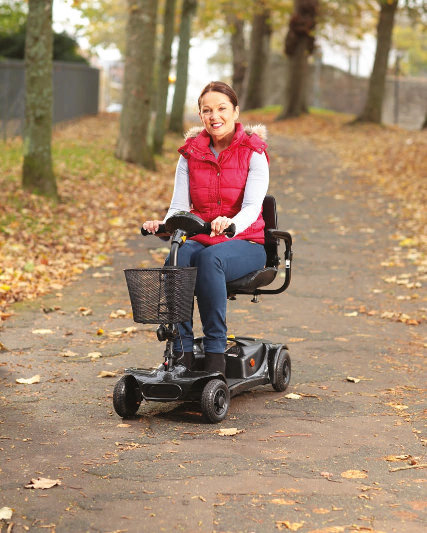 Electric Mobility Rascal Ultralite 480 Mobility Scooter being driven in the park