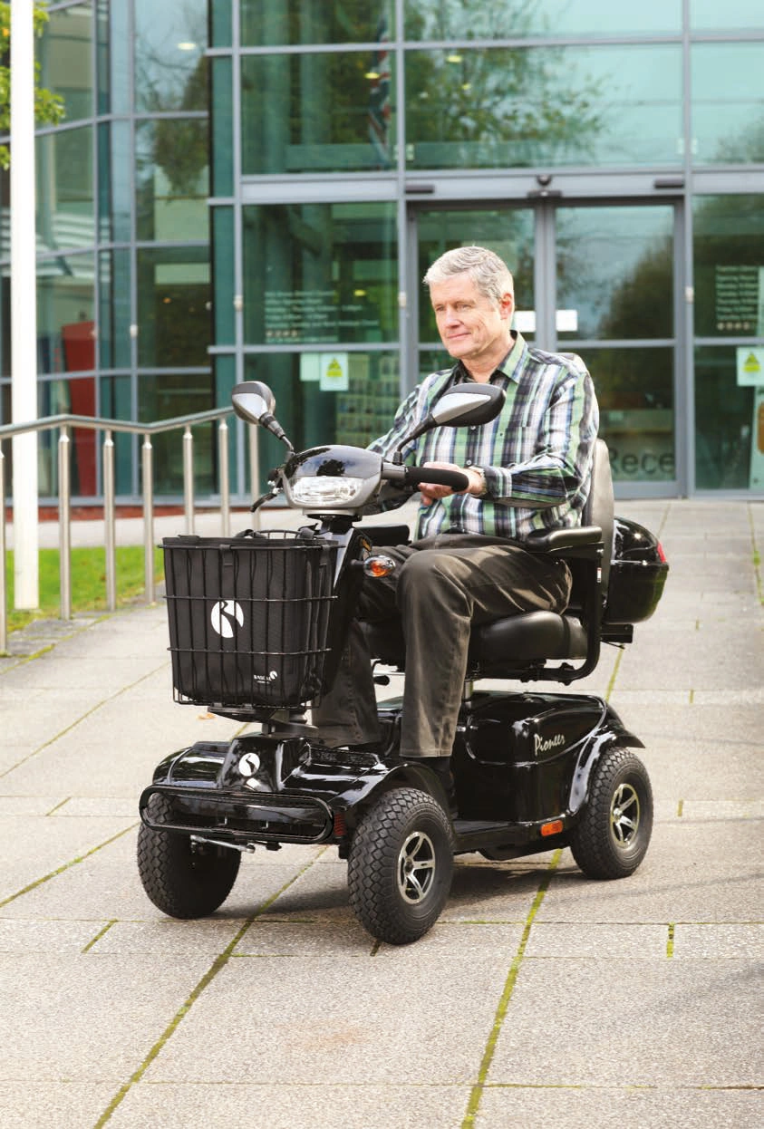 Electric Mobility Rascal Pioneer Mobility Scooter in Black outdoors