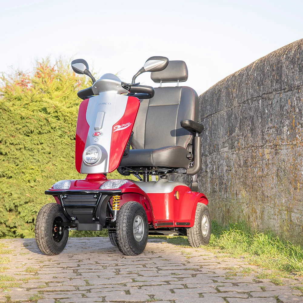 Kymco Maxi XLS Mobility Scooter on rough cobbled terrain