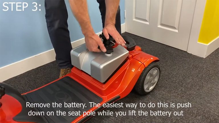 Step 3) Remove the battery. The easiest way to do this is push down the seat pole while you lift the battery out