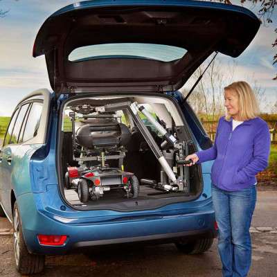 Autochair Car Boot Hoist Smart Lifter LP Mobility Scooter Being Placed in The Boot