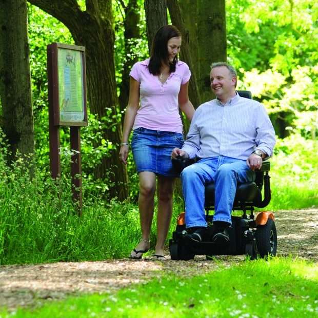 Electric Mobility Heavy Duty Rascal Rivco Powerchair in the woods