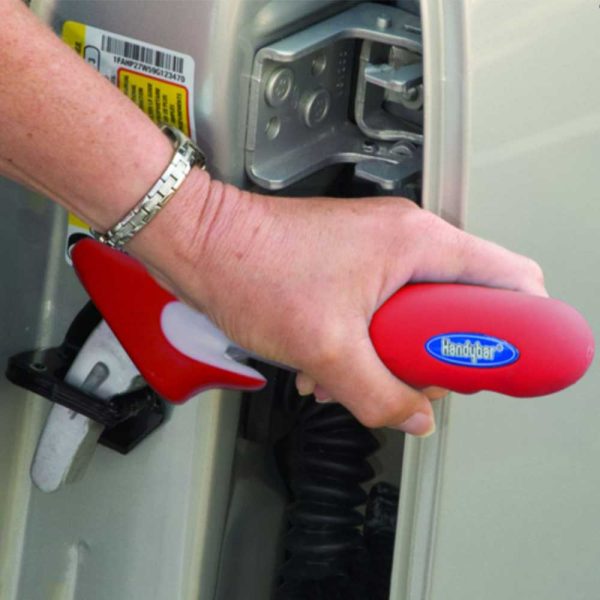 Handybar easy grip mobility transfer aid placed in a car door